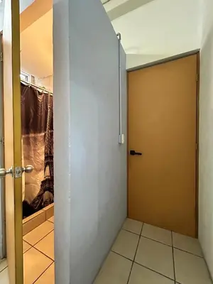 Un baño de Habitación con baño privado para 1 persona cerca del ESTADIO AZTECA-BANORTE