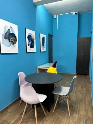 Zona de estar de Habitación con baño privado para 1 persona cerca del ESTADIO AZTECA-BANORTE