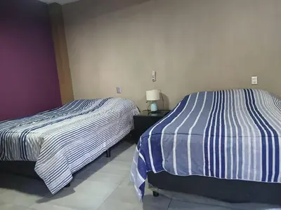 Cama o camas de una habitación en casa ex hacienda casasano