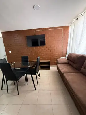 Una televisión o centro de entretenimiento en Departamento Villas Doradas