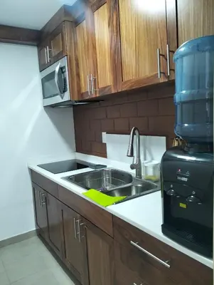 Una cocina o zona de cocina en Departamento Villas Doradas