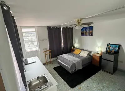 Cama o camas de una habitación en C2 La Casona Xalapa