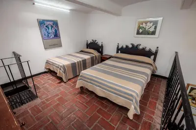 Cama o camas de una habitación en Hotel Posada Casa de la Tía