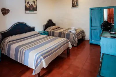 Cama o camas de una habitación en Hotel Posada Casa de la Tía