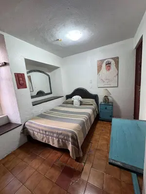 Cama o camas de una habitación en Hotel Posada Casa de la Tía