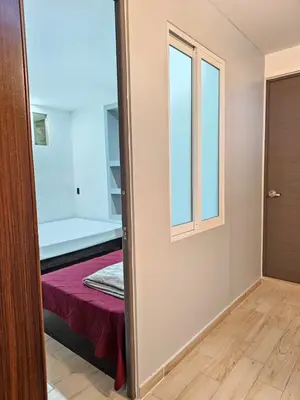 Cama o camas de una habitación en Hospedaje La Escondida