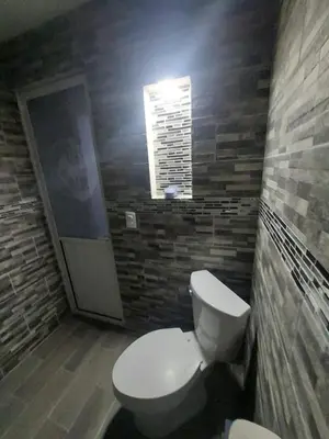 Un baño de departamento 2 en condominio
