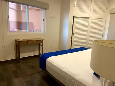Cama o camas de una habitación en Palmarena Residences 2 Bedroom Ocean Front Condo 180 degree ocean views