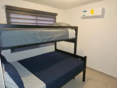 Cama o camas de una habitación en Villa Residencial con Piscina y Club de Playa 3 Hab