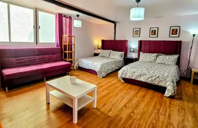 Cama o camas de una habitación en Suite morada Moderna y céntrica ideal hasta para 7 viajeros