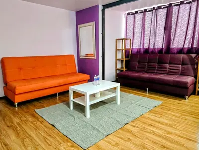 Zona de estar de Suite morada Moderna y céntrica ideal hasta para 7 viajeros