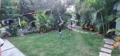 Jardín al aire libre en Posada Sarita