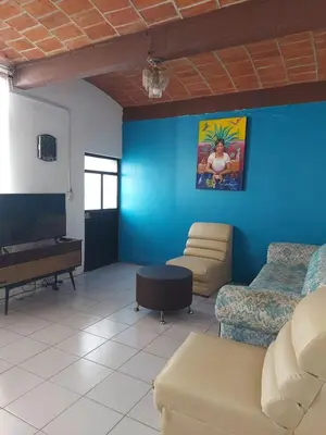 Una televisión o centro de entretenimiento en In Oaxaca Casa RodSa