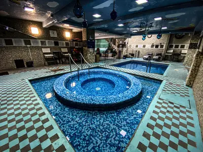Piscina en o cerca de Departamento con servicio de hotel