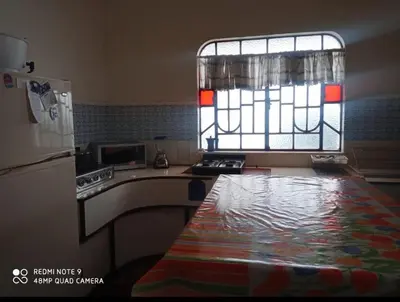 Una cocina o zona de cocina en Hospedaje en habitación casa colonial centro histórico Puebla