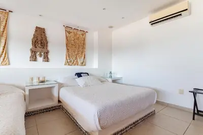 Cama o camas de una habitación en Amplio Departamento con Vistas Espectaculares