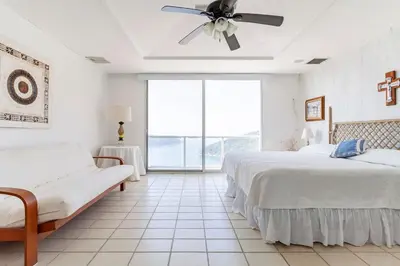 Cama o camas de una habitación en Amplio Departamento con Vistas Espectaculares