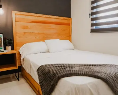 Cama o camas de una habitación en Departamento Tulipanes - Vista increíble de la CD