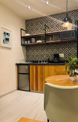 Una cocina o zona de cocina en Departamento Tulipanes - Vista increíble de la CD