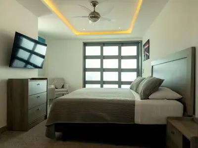 Cama o camas de una habitación en Oceanfront Apartment in Acapulco, 4 Bedrooms