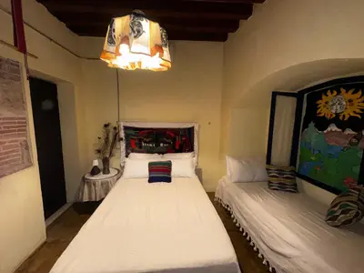 Cama o camas de una habitación en Atelier Oaxaca