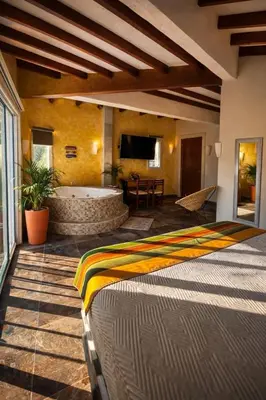 Cama o camas de una habitación en Nequi Hotel Boutique