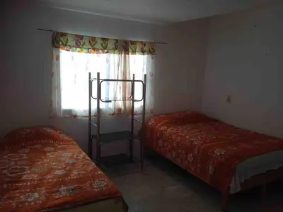 Cama o camas de una habitación en Dianas Home Oaxtepec