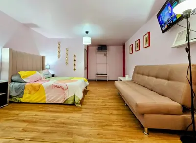 Cama o camas de una habitación en Suite Rosa familiar para hasta 6 huéspedes Amplia, céntrica, con cocineta y baño privado