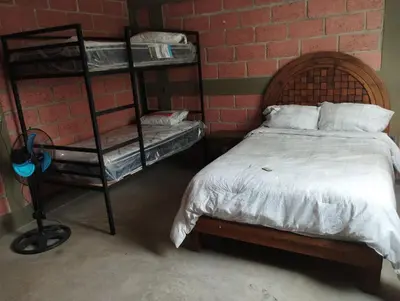 Cama o camas de una habitación en Bonita casa equipada, cerca de jardines de México
