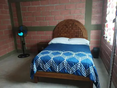 Cama o camas de una habitación en Bonita casa equipada, cerca de jardines de México