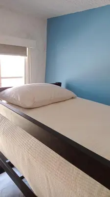 Cama o camas de una habitación en Depto LUX-A&A con terraza privada
