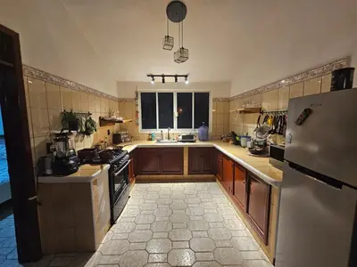 Una cocina o zona de cocina en Casa Amanecer
