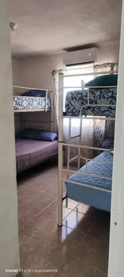Cama o camas de una habitación en Casa Guacamayas