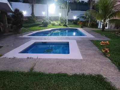 Piscina en o cerca de Departamento con ubicacion priviligiada cerca de la playa