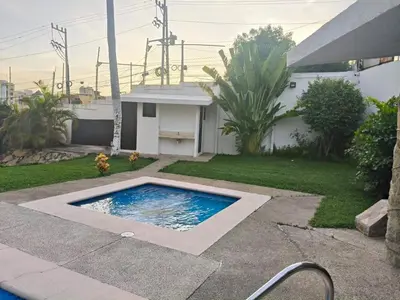 Piscina en o cerca de Departamento con ubicacion priviligiada cerca de la playa