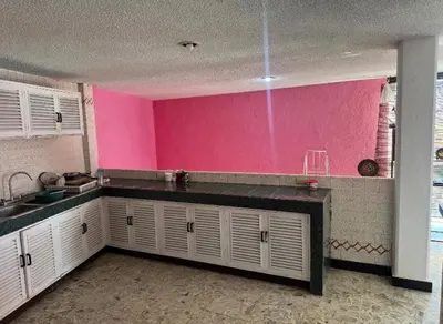 Una cocina o zona de cocina en Villa La Rosa Acapulco