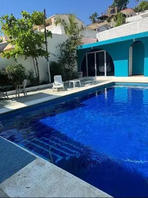 Piscina en o cerca de Villa La Rosa Acapulco
