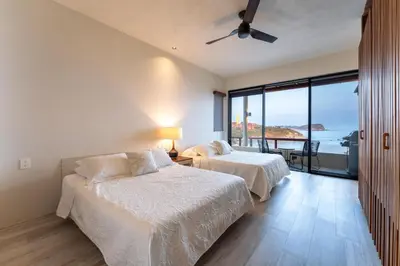 Cama o camas de una habitación en 3083 - Amanecer C2