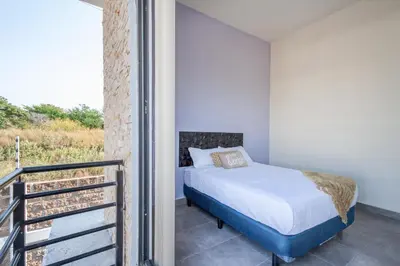 Cama o camas de una habitación en Casa Bamboo El Salto