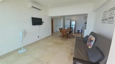 Una televisión o centro de entretenimiento en Vista de ensueño en Playa Diamante