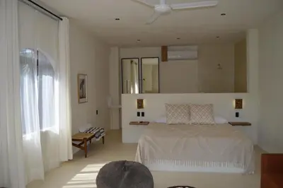 Cama o camas de una habitación en Hotel Men Zipolite