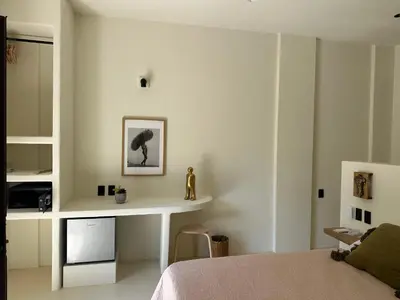 Cama o camas de una habitación en Hotel Men Zipolite