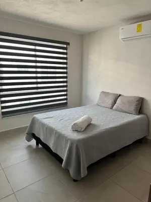 Cama o camas de una habitación en Departamento en zona Diamante a 3 minutos del mar
