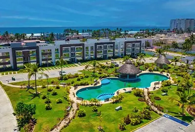 Piscina en o cerca de Departamento en zona Diamante a 3 minutos del mar