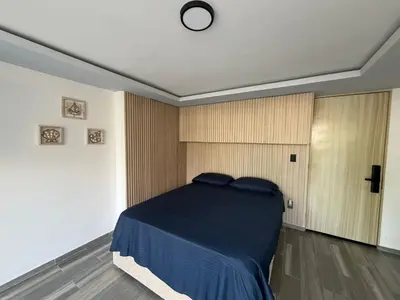 Cama o camas de una habitación en Loft con hermosa vista a la bahía de Acapulco
