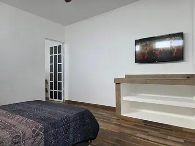 Cama o camas de una habitación en La Casa Blanca VIP