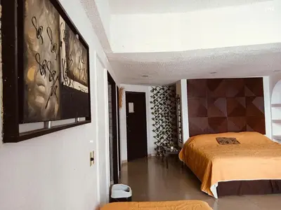 Cama o camas de una habitación en SUITE TORRES GEMELAS 2902 vista al mar