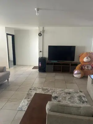 Una televisión o centro de entretenimiento en Casa vista hermosa