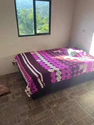 Cama o camas de una habitación en Casa vista hermosa
