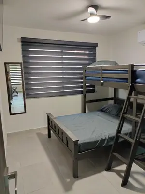 Cama o camas de una habitación en Fabuloso departamento de 4 recamaras en Dream Diamante